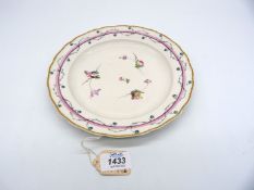 An early Derby plate with sprays of flowers and two pink bands around the rim entwined with