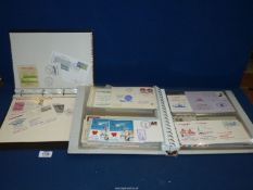 Two Albums containing a quantity of mainly French souvenir/commemorative Postcards and envelopes,