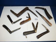 Eight pocket/penknives including four with antler type handles including a cavalry type knife with