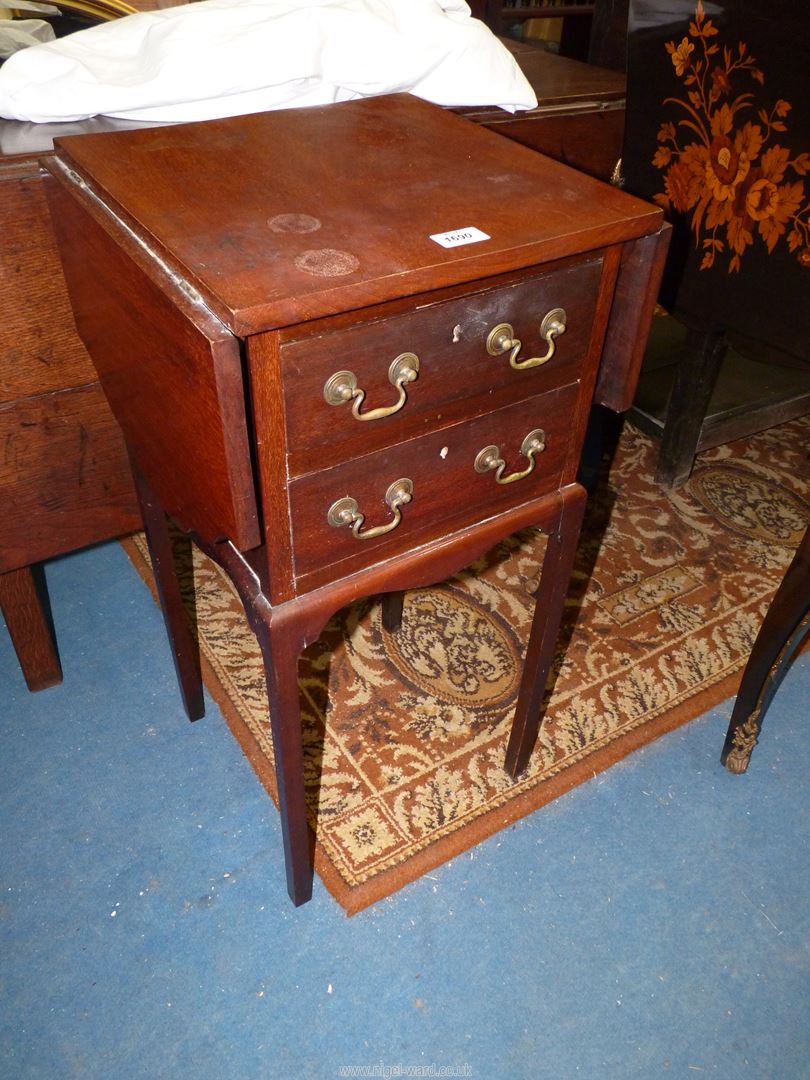 A Mahogany nightstand/bedside Table having two short drawers with brass drop swan-neck handles and