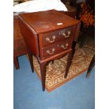 A Mahogany nightstand/bedside Table having two short drawers with brass drop swan-neck handles and