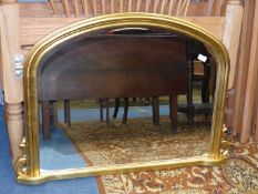 A contemporary overmantel mirror having a gold coloured frame, 40 1/2" x 24 1/4" approx.