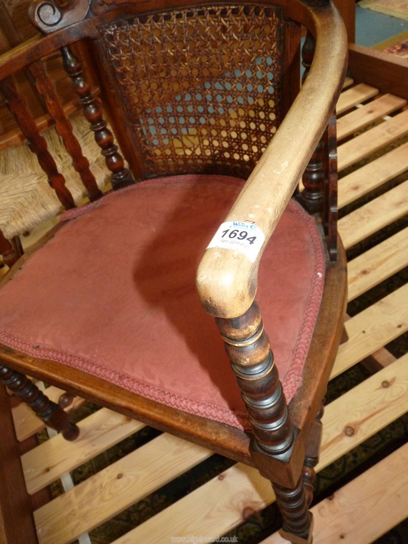 An unusual mixed woods open armed Elbow Chair having a scroll decorated carved and fretworked top - Image 3 of 3