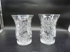 A pair of cut glass candle holders with separate bases, 8 1/2" tall.