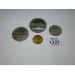 Four coins depicting Crystal Palace , one coin for the Great Exhibition in London 1851,