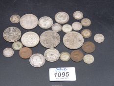 A quantity of coins to include; twelve silver threepences, three farthings,