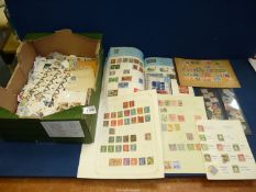 A quantity of loose stamps, sheet albums with some to include Edward VII, etc.