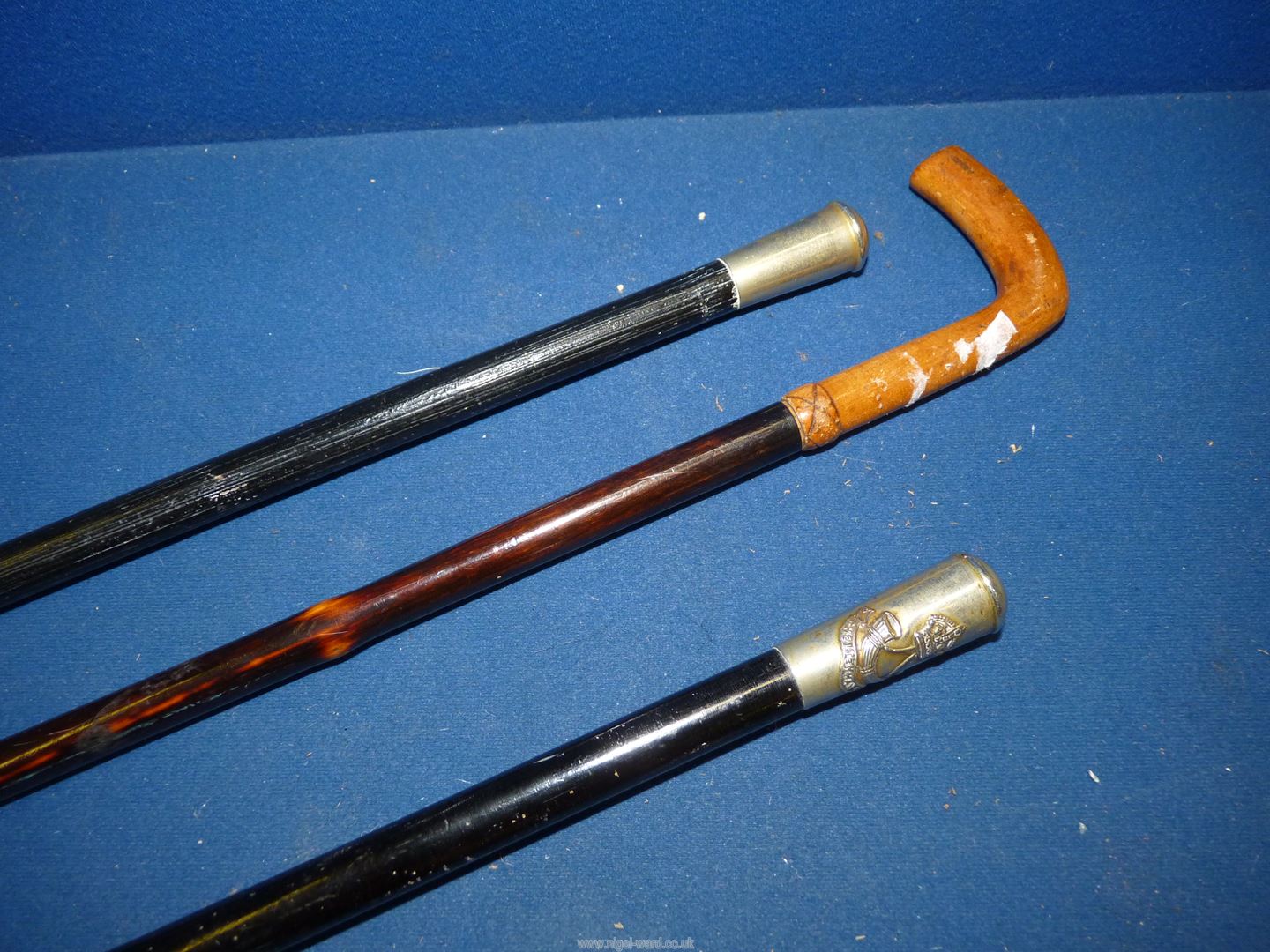 Three swagger sticks, one having Cheltenham College crest. - Image 2 of 3