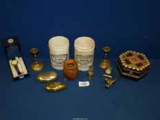 A quantity of miscellanea to include two small brass candlesticks, snuff box and cat,