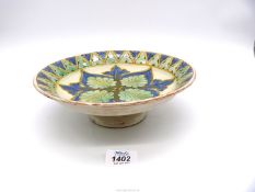 A Della Robbia footed bowl signed J. F. for John Fogo (chip under rim of foot).