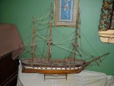 A wooden model of US Constellation 1798 Frigate on stand, 37" x 29".