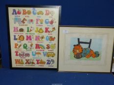 A framed Print depicting letters of the Alphabet,