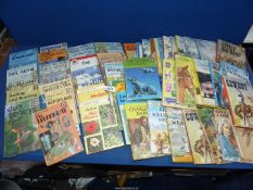 A quantity of Ladybird books to include Stamp Collecting, Stars, Little big horn, etc.