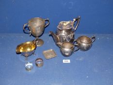 A pewter ashtray and cup and a quantity of silver plated items including a presentation teapot,