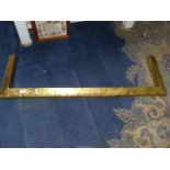 A brass Fire Fender, 46" wide x 14" deep.