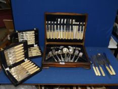 A canteen of mixed cutlery and two display boxes including fish knives and forks, cake server,