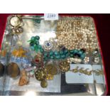 A small quantity of costume jewellery including brooches, faux pearls, rings, necklaces etc.