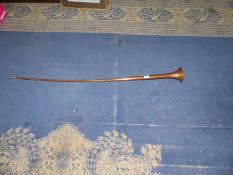 A copper and brass Hunting Horn, a/f, 50" long.