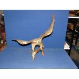 A large brass Eagle with outstretched wings, 21 1/2" tall.