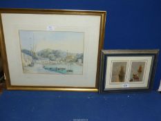 A framed picture of two postcards depicting seascapes and a framed and mounted Watercolour of
