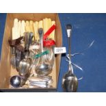 A box of cutlery including a very large serving spoon, etc.