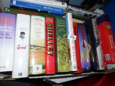 A box of books to include autobiographies, Joan Collins,