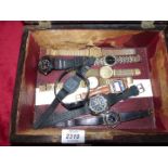 A rosewood trinket Box containing Watches including "Casio alarm chrono" and a flip-action quartz