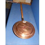 A Copper warming Pan.