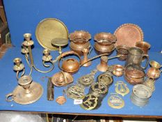 A quantity of copper and brass including jardinieres, martingales, candelabra, spring balance, etc.