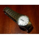 A lady's Longines stainless steel Wristwatch having a cream face with sweep second hand and date