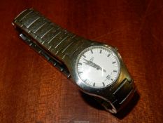 A lady's Longines stainless steel Wristwatch having a cream face with sweep second hand and date