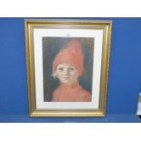 A framed and mounted Portrait of a child wearing red, no visible signature. 19 1/2" x 23 1/2".