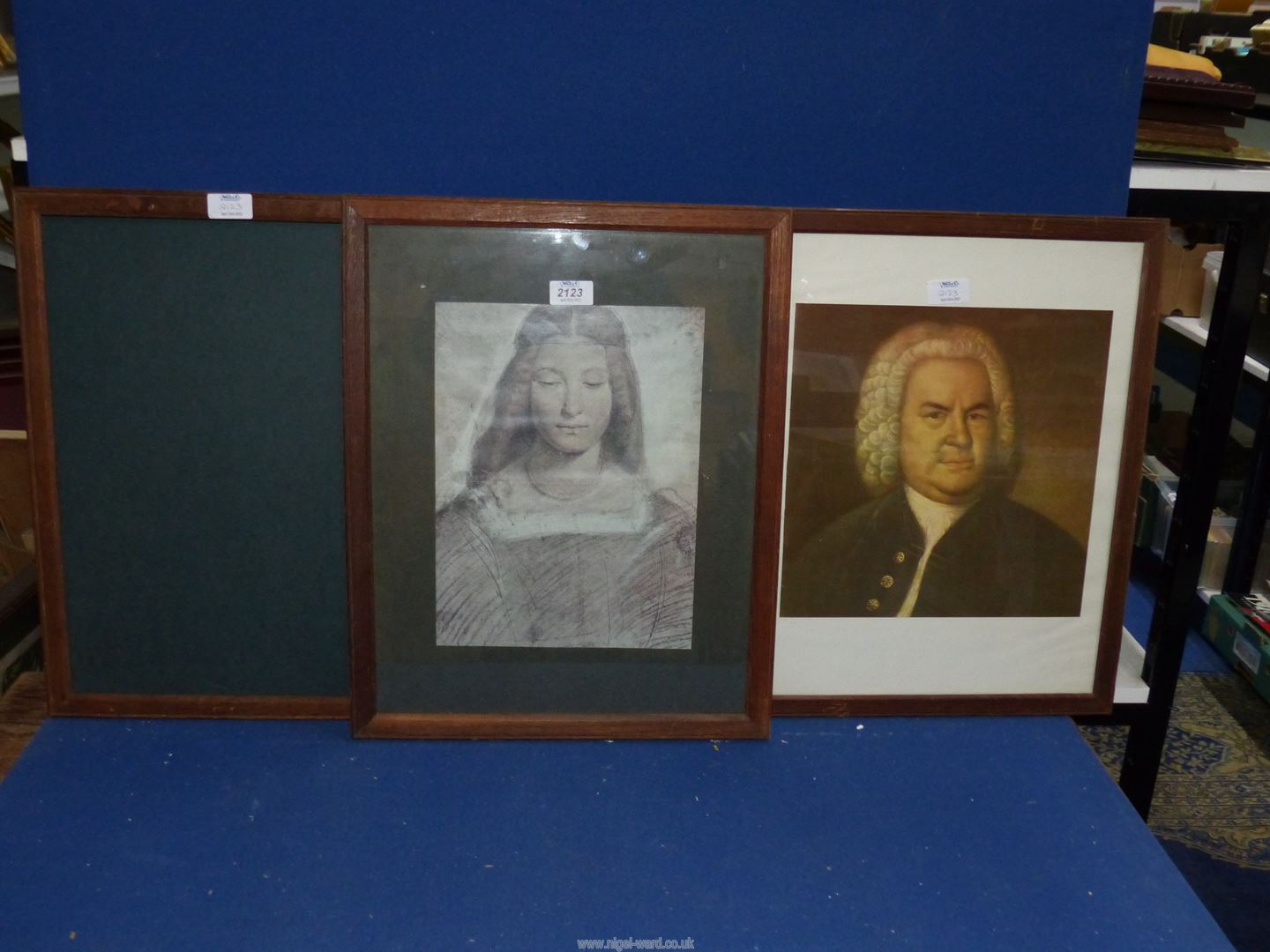 A wooden framed Portrait Print of Johann Sebastian Bach, a framed Print of Isabella of Aragon,