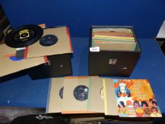 Two cases of 45 rpm records to include Joe Brown, Ringo Starr, Mary Hopkin, etc.