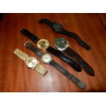 Five watches including an Ingersol gents watch with Arabic numerals (not running),