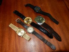 Five watches including an Ingersol gents watch with Arabic numerals (not running),