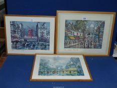 Three framed Prints depicting various street scenes of Paris.