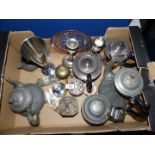 A quantity of metalware to include coffee pot, teapot and lidded stein, brass leaf design call bell,