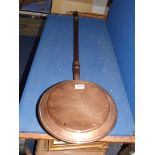 A Copper warming Pan.