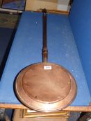 A Copper warming Pan.