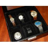 A watch dispaly case containing Five watches including an Avia 17 jewels incabloc gents watch with