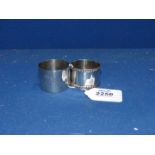 Two Silver napkin rings; one by I.M.