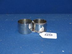 Two Silver napkin rings; one by I.M.