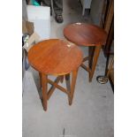 Two round foldable tables.