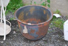 A cast iron boiler pot.