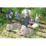 A quantity of garden ornaments, dog, mole, cat, rabbit etc.