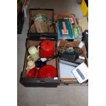 Four boxes of games, enamel kitchen ware, paper guillotine etc.