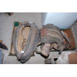 Old horse tack; heavy horse harness.