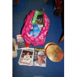 A large quantity of Cricket magazines, circular cake/place mats in pink trolley bag.