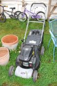A Lawn King 98 lawn mower 173 cc overhead valve engine, good compression, with grass box.